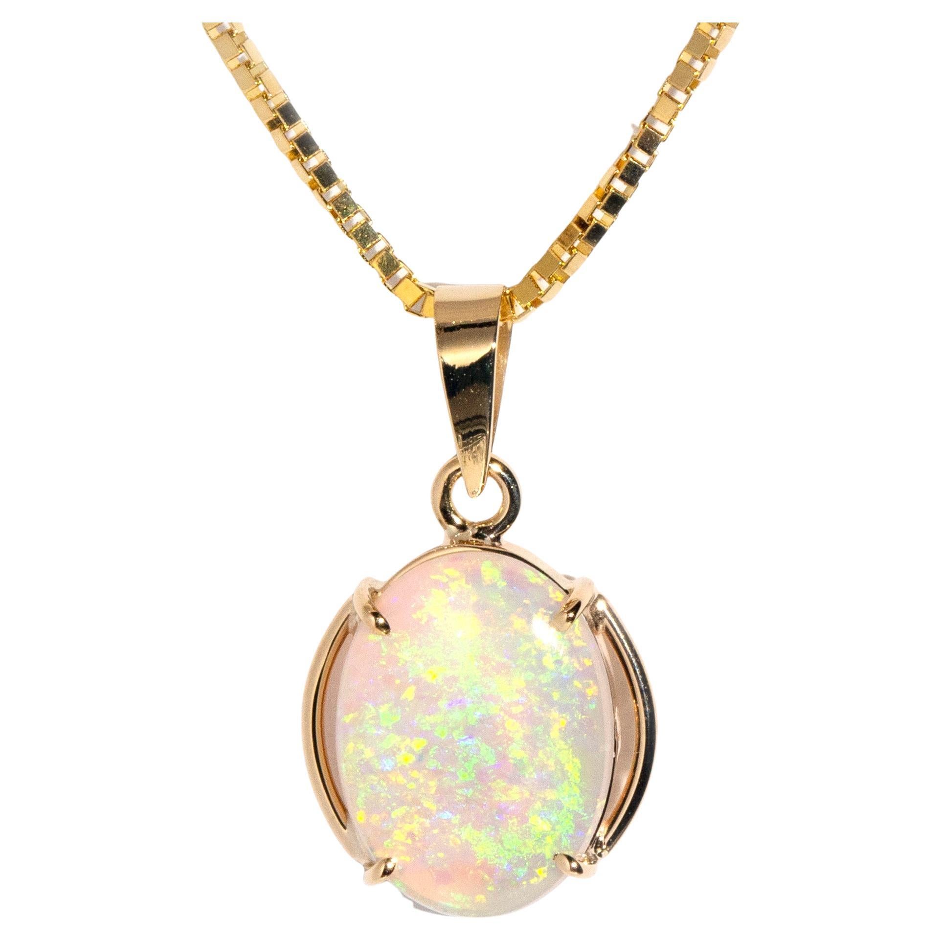 Vintage circa 1980s 14 Carat Yellow Gold Oval Crystal Opal Pendant & Fine Chain