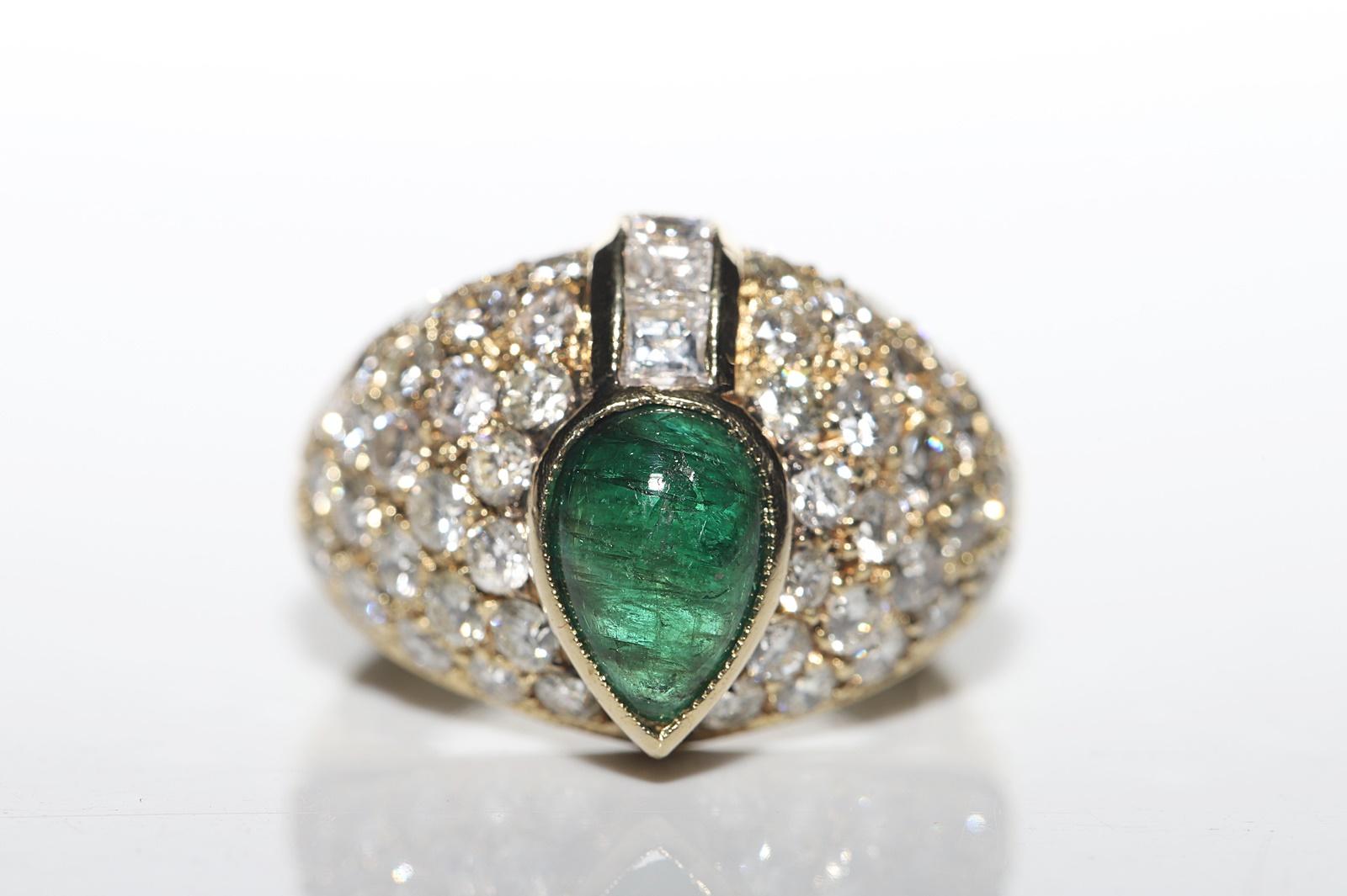 Retro  Vintage Circa 1980s 14k Gold Natural Diamond And Cabochon Emerald Decorated Ri For Sale