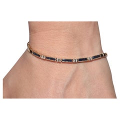 Vintage Circa 1980s 14k Gold Natural Diamond And Caliber Cut Sapphire Bracelet