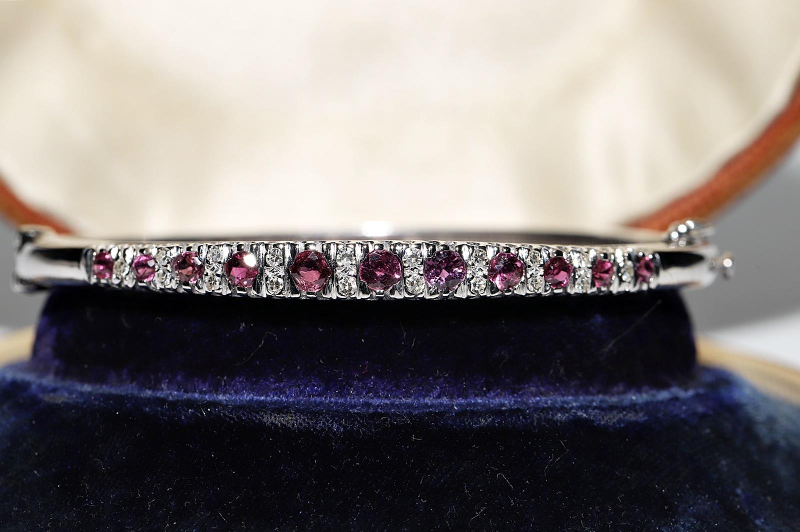 Women's Vintage Circa 1980s 14k Gold Natural Diamond And Ruby Decorated Bangle Bracelet  For Sale