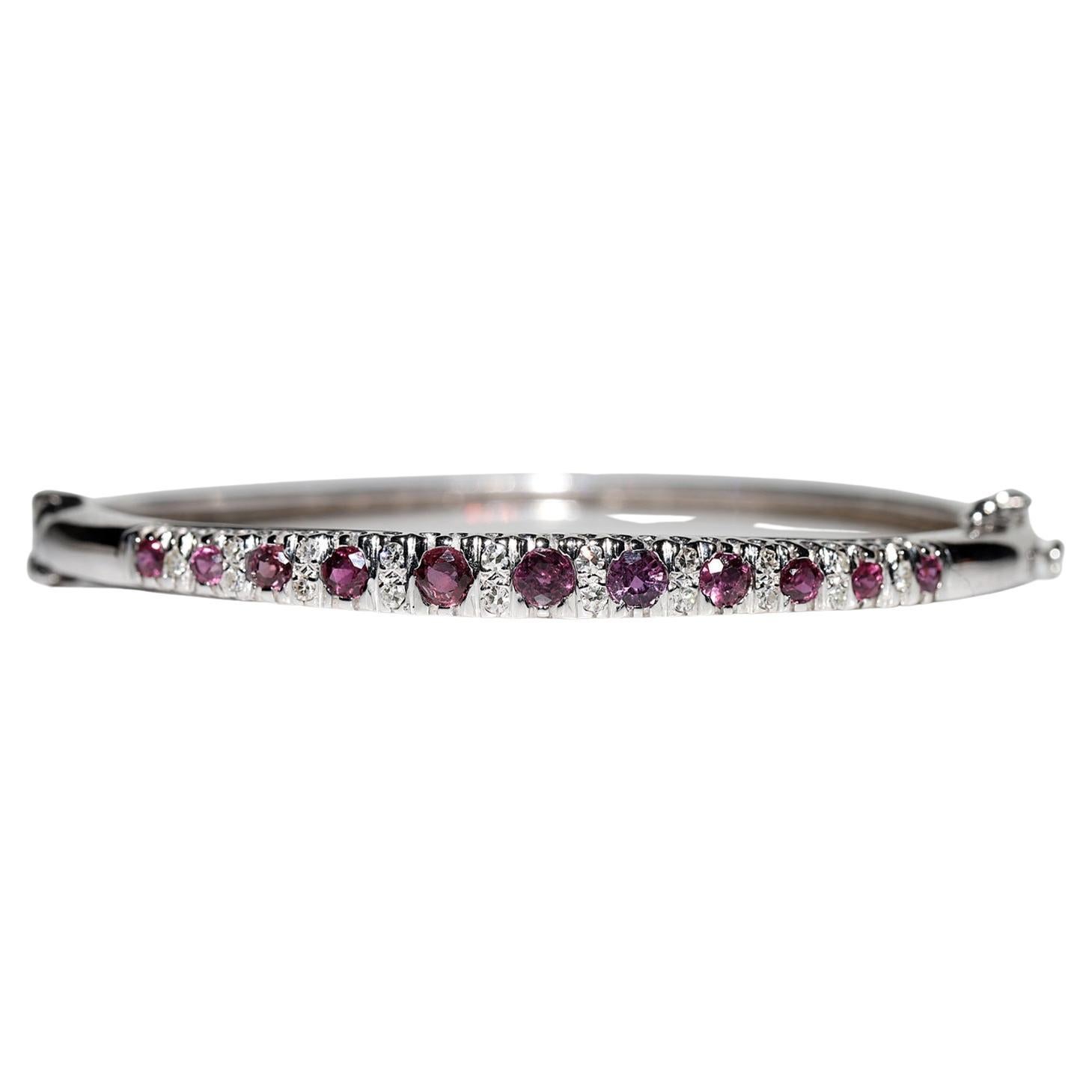 Vintage Circa 1980s 14k Gold Natural Diamond And Ruby Decorated Bangle Bracelet  For Sale