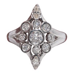 Vintage Circa 1980s 14k Gold Natural Diamond Decorated Navette Design Ring