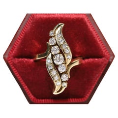Retro Circa 1980s 14k Gold Natural Diamond Decorated Navette Ring