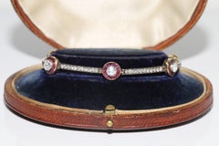 Vintage Circa 1980s 14k Gold Top Silver Natural Diamond And Ruby Tennis Bracelet