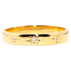 Vintage circa 1980s 18 Carat Yellow Gold Star Set Three Stone Diamond Band