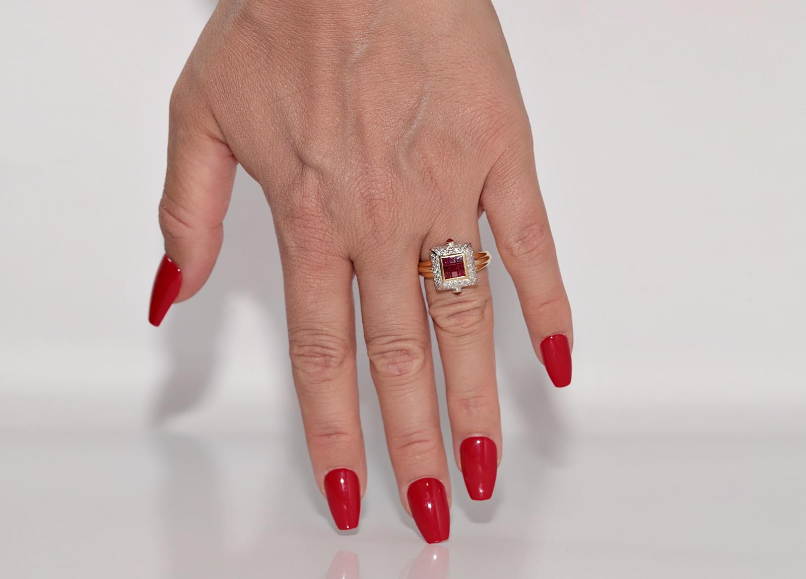 In very good condition.
Total weight is 8.5 grams.
Totally is diamond 0.40 ct.
The diamond is has G color and vvs1-vs1 clarity.
Totally is ruby 0.45 ct.
Ring size is US 6.5 
We can make any size.
The box is not included.
Please contact for any