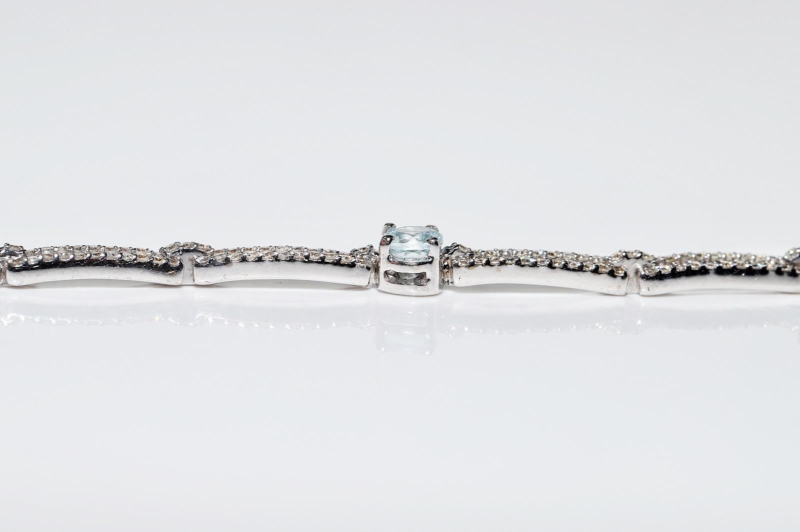 Vintage Circa 1980s 18k Gold Natural Diamond And Blue Topaz Tennis Bracelet For Sale 8