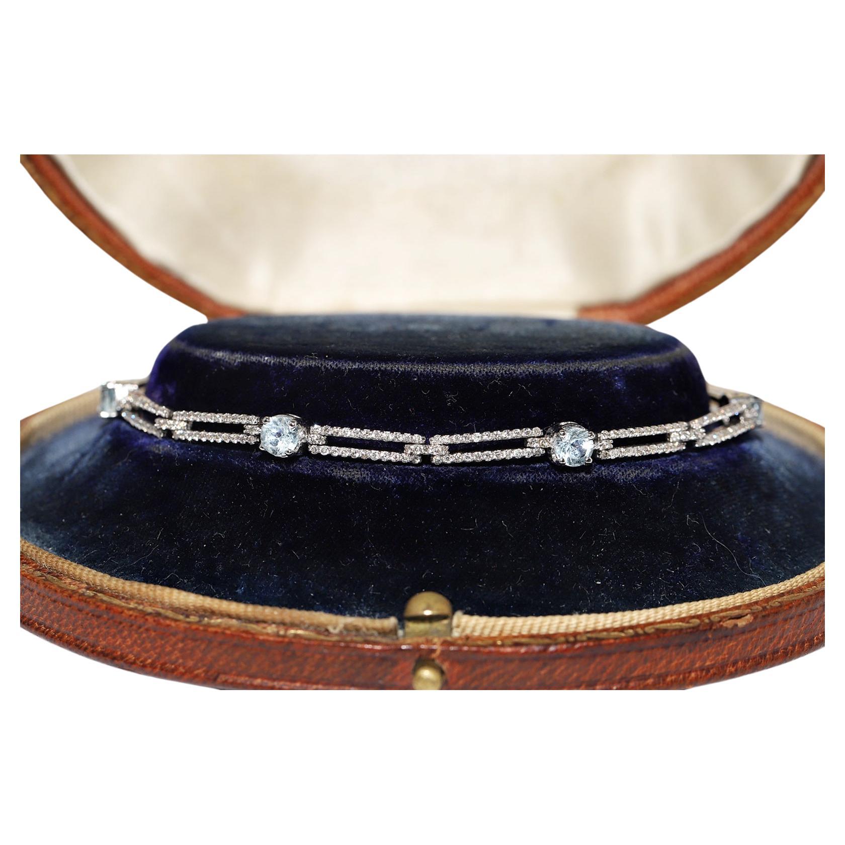 Vintage Circa 1980s 18k Gold Natural Diamond And Blue Topaz Tennis Bracelet For Sale