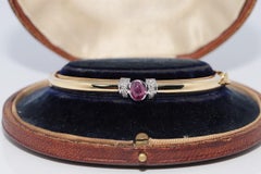 Vintage Circa 1980s 18k Gold Natural Diamond And Cabochon Ruby Bangle Bracelet