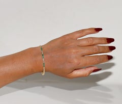 Vintage Circa 1980s 18k Gold Natural Diamond And Caliber Cut Emerald Bracelet