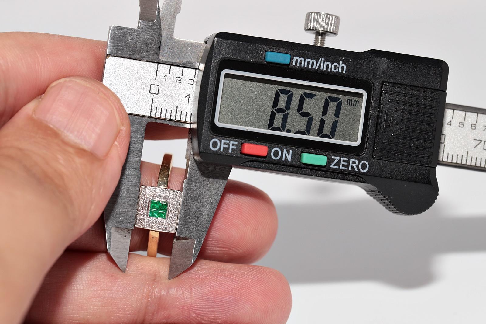 Vintage Circa 1980s 18k Gold Natural Diamond And Caliber Cut Emerald Square Ring For Sale 9