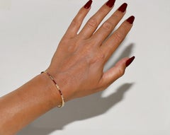 Armband aus 18 Karat Gold mit natürlichen Diamanten und Rubin im Kaliberschliff, Vintage, ca. 1980er Jahre