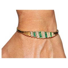 Vintage Circa 1980s 18k Gold Natural Diamond And Emerald Bangle Bracelet