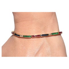 Bracciale Vintage CIRCA 1980 in oro 18k con diamanti naturali e smeraldo e rubino zaffiro