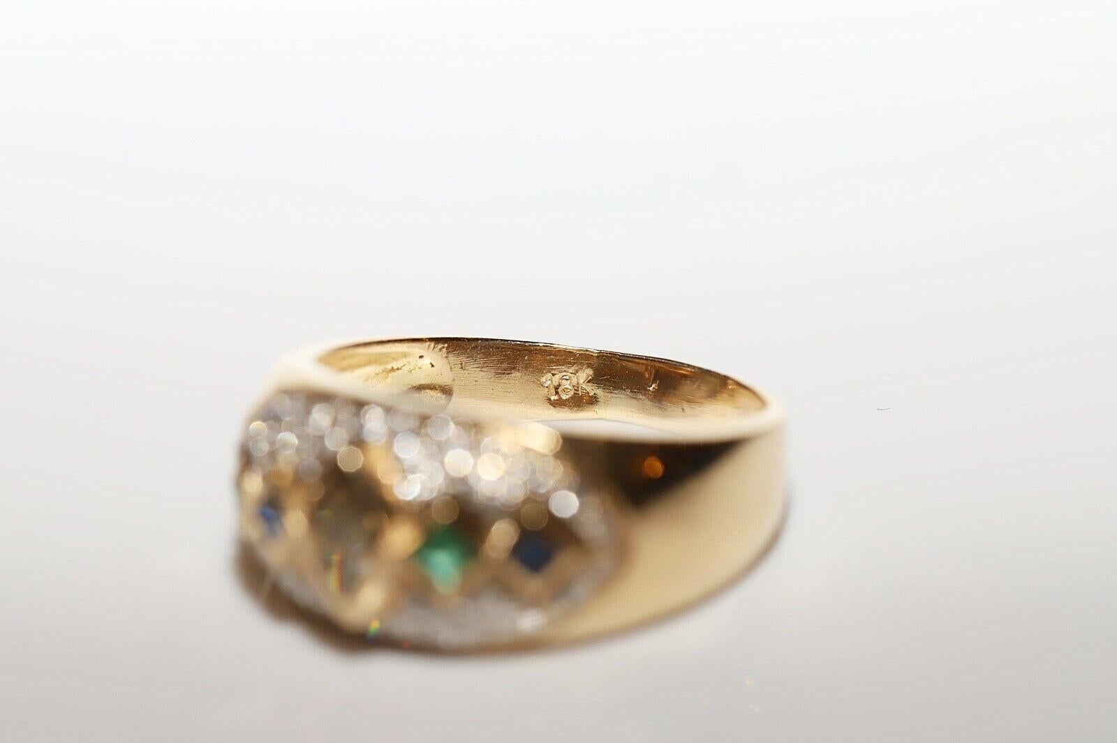 Vintage Circa 1980s 18k Gold Natural Diamond And Emerald Sapphire Decorated Ring For Sale 1