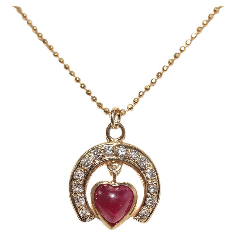 Vintage Circa 1980s 18k Gold Natural Diamond And Heart Cut Ruby Necklace For Sale