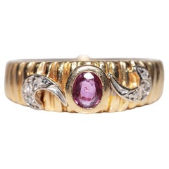 Bague vintage des années 1980, or 18 carats, diamant naturel et rubis taille ovale décoré