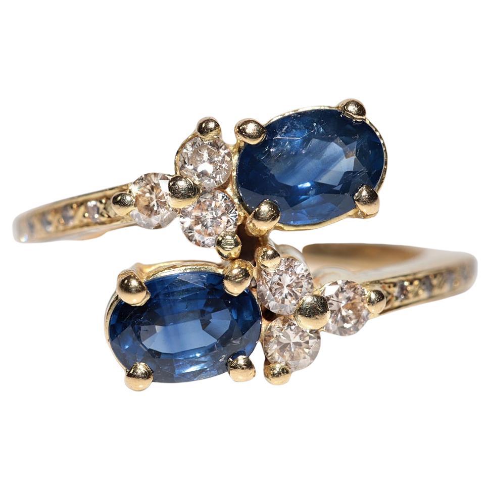 Anillo vintage circa años 80 de oro de 18k con diamante natural y zafiro talla oval