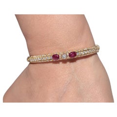 Vintage Circa 1980s 18k Gold Natural Diamond And Ruby Decorated Bangle Bracelet