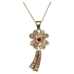 Collier vintage des années 1980, or 18 carats, diamant naturel et rubis décoré de fleurs