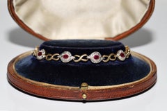 Bracciale da tennis decorato con diamanti naturali e rubini in oro 18 ct. d'epoca CIRCA 1980