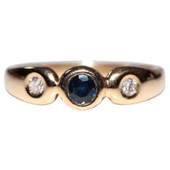 Vintage Circa 1980s Anillo de Oro de 18k Decorado con Diamantes Naturales y Zafiro