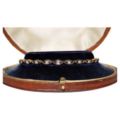 Retro Circa 1980s 18k Gold Natural Diamond And Sapphire Decorated Bracelet