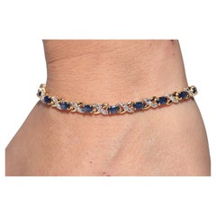 Vintage Circa 1980s 18k Gold Natural Diamond And Sapphire Decorated Bracelet