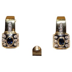 Orecchino decorato con diamanti naturali e zaffiri in oro 18 carati, vintage, anni 
80 circa.