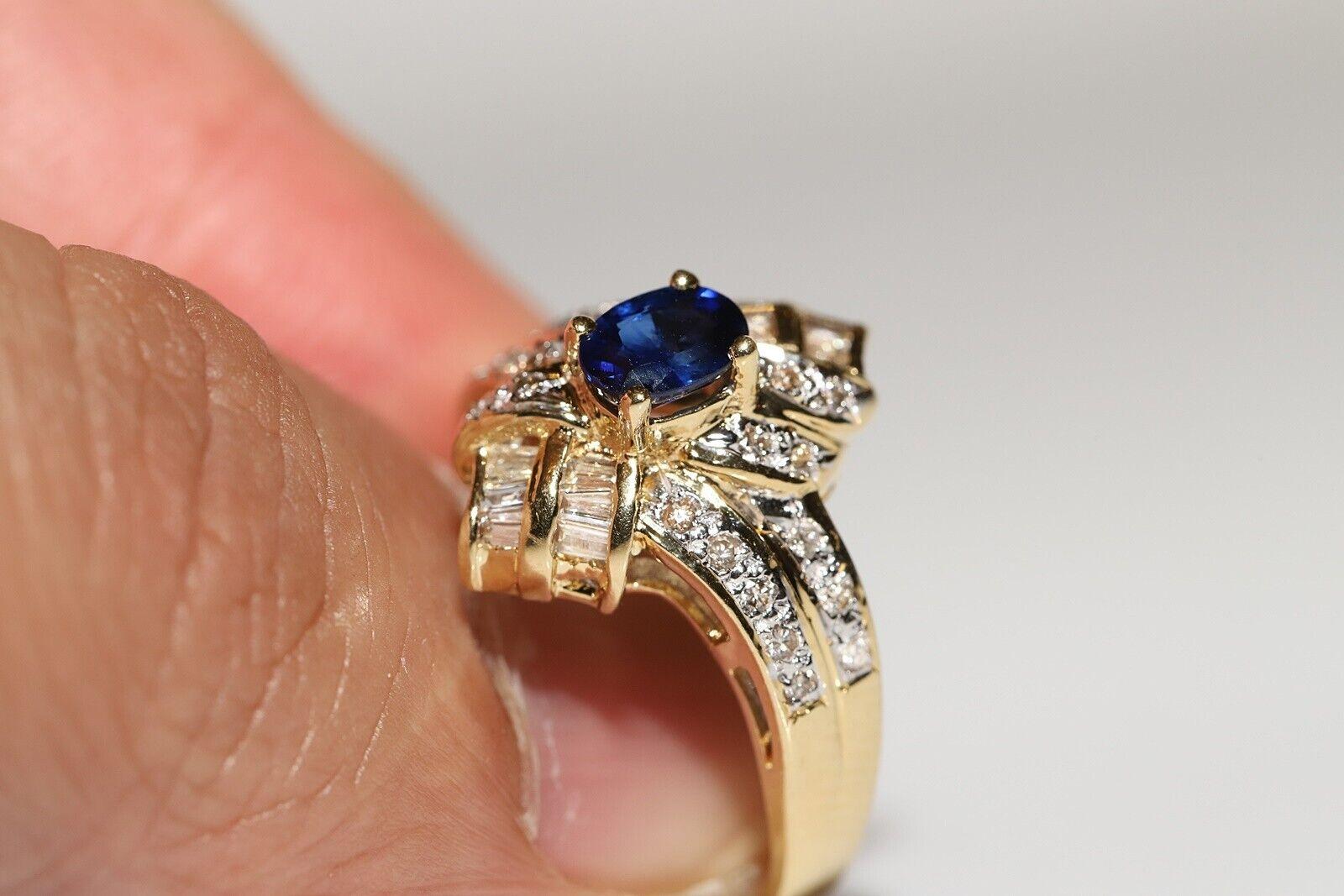 Vintage Circa 1980s 18k Gold Natural Diamond And Sapphire Decorated Navette Ring In Good Condition For Sale In Fatih/İstanbul, 34