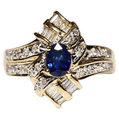 Retro Circa 1980s 18k Gold Natural Diamond And Sapphire Decorated Navette Ring