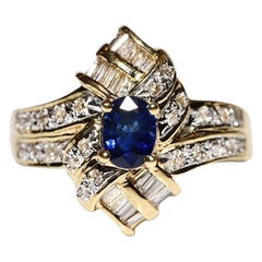 Bague navette vintage des années 1980 en or 18 carats décorée de diamants naturels et de saphirs