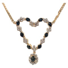 Collana decorata con diamanti naturali e zaffiri in oro 18 carati, vintage, anni '80 circa.