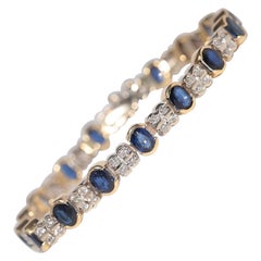 Vintage Circa 1980s 18k Gold Natural Diamond And  Sapphire Tennis bracelet