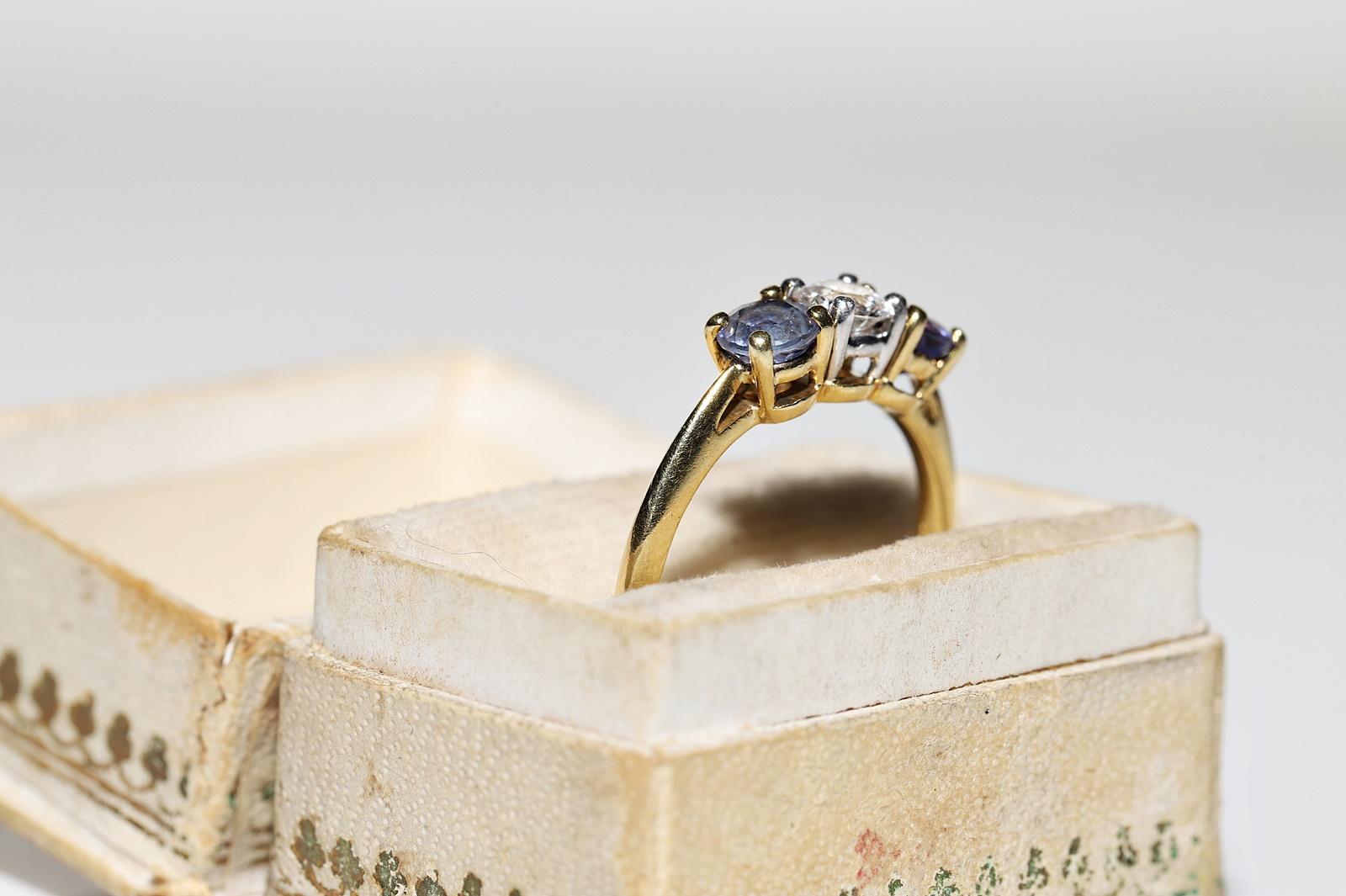 Dekorierter Vintage-Ring aus 18 Karat Gold mit natürlichem Diamant und Tansanit, ca. 1980er Jahre (Retro) im Angebot