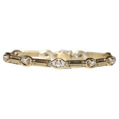 Bracciale decorato con diamanti naturali in oro 18k CIRCA 1980