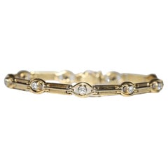 Vintage Circa 1980 Bracelet en or 18k orné de diamants naturels 