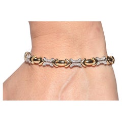 Bracciale forte d
oro 18k decorato con diamanti naturali, CIRCA GLI ANNI 80
