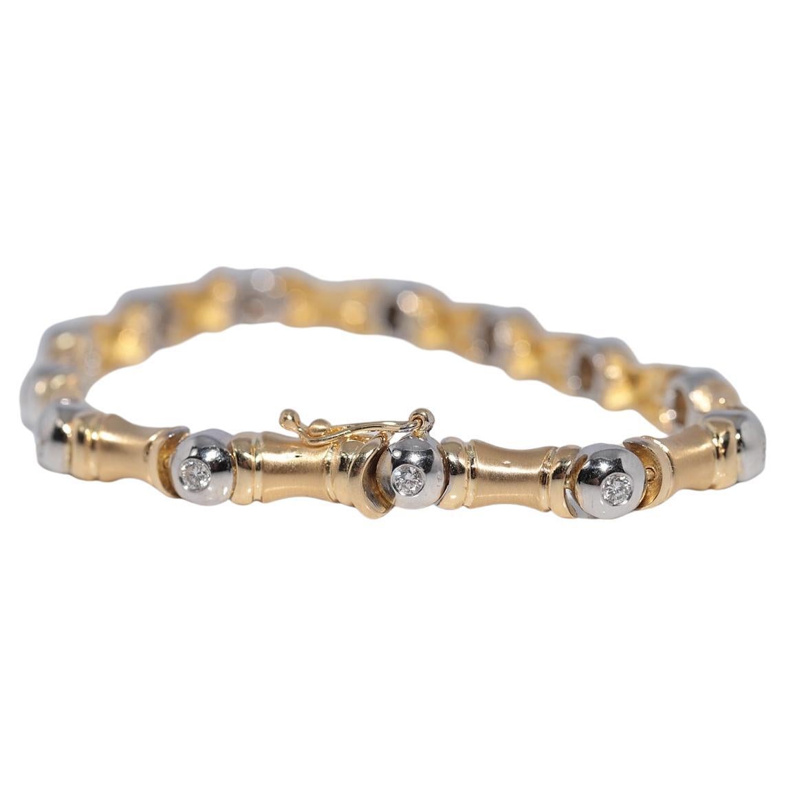 Bracciale forte d
oro 18k decorato con diamanti naturali, CIRCA GLI ANNI 80 in vendita