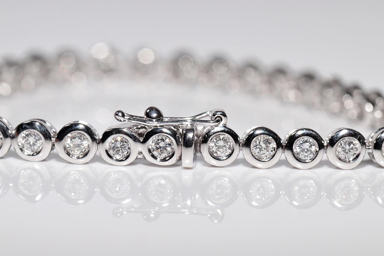Vintage Circa 1980 Bracelet de tennis en or 18k orné de diamants naturels en vente 4