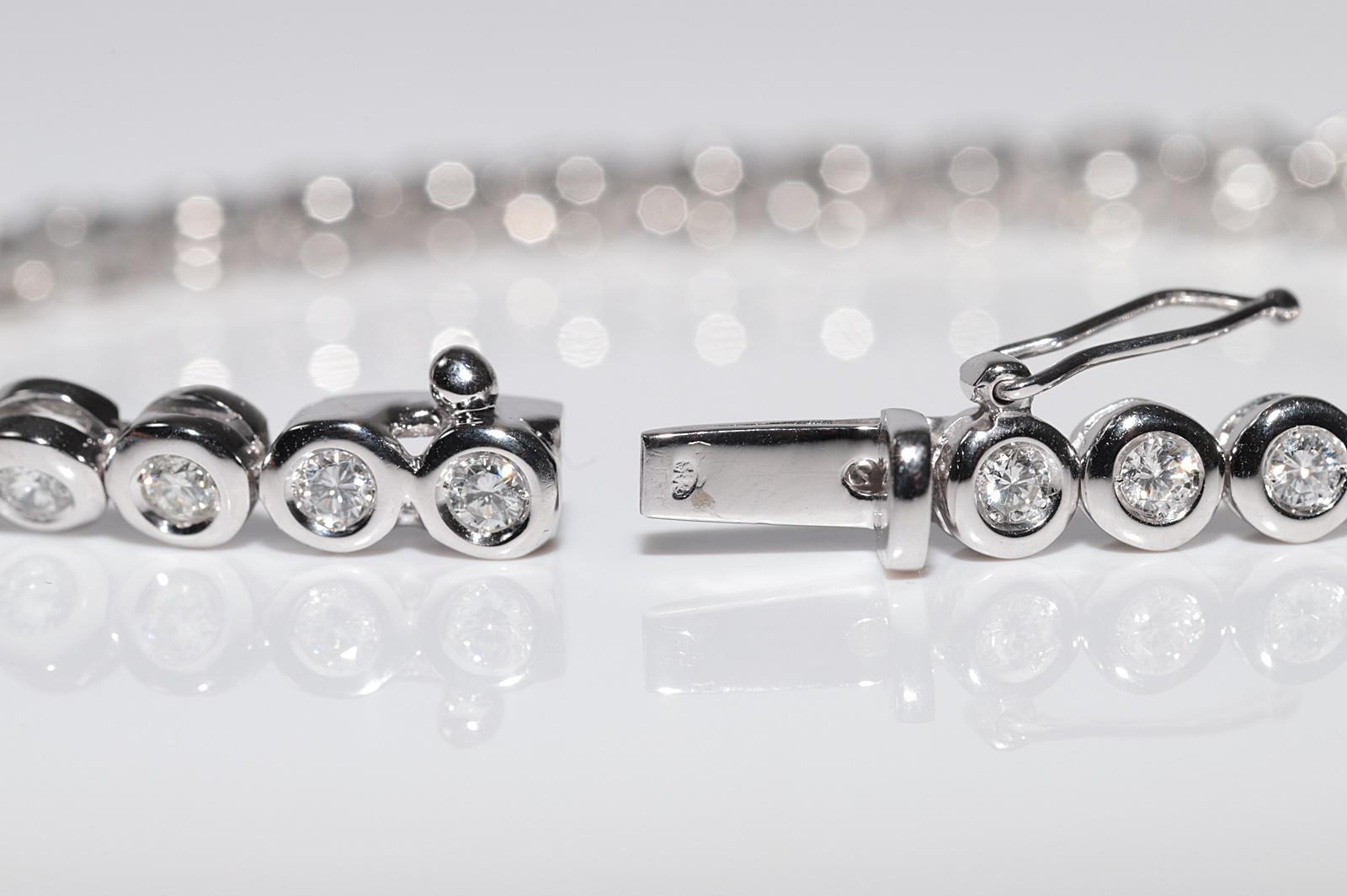 Vintage Circa 1980 Bracelet de tennis en or 18k orné de diamants naturels en vente 5