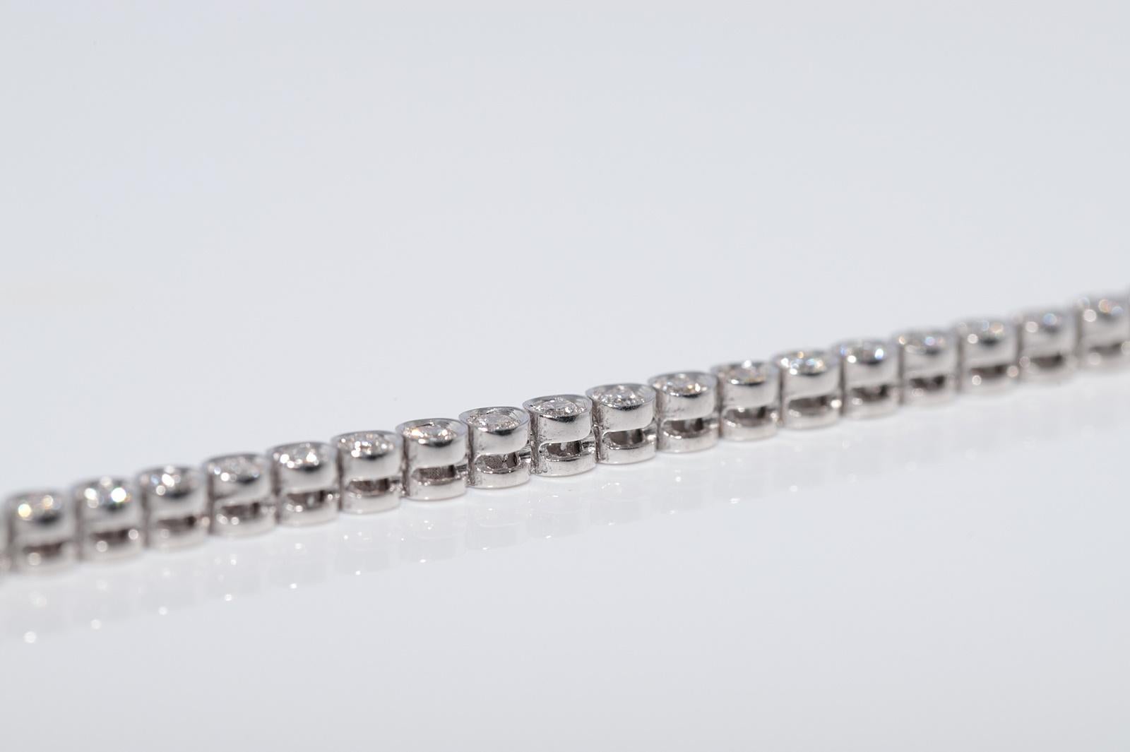 Bracciale da tennis decorato con diamanti naturali in oro 18 ct. d'epoca CIRCA 1980 in vendita 5