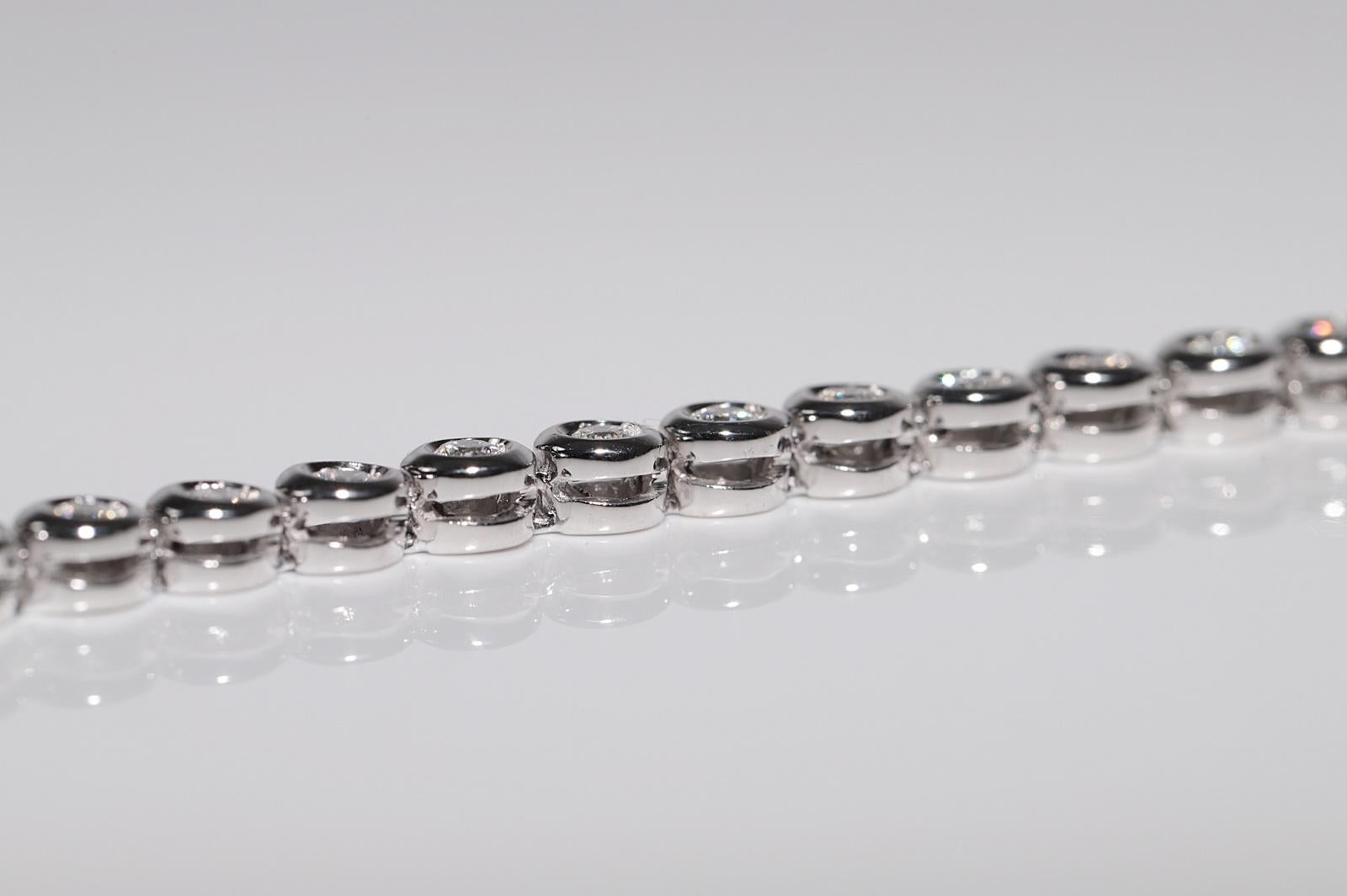 Vintage Circa 1980 Bracelet de tennis en or 18k orné de diamants naturels en vente 7