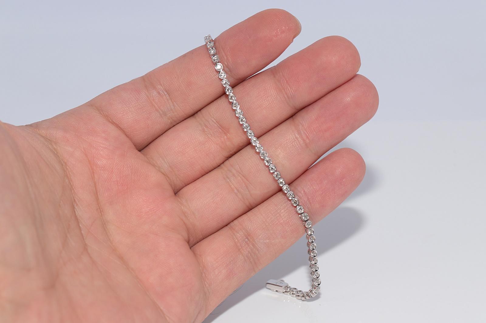 Bracciale da tennis decorato con diamanti naturali in oro 18 ct. d'epoca CIRCA 1980 in vendita 7