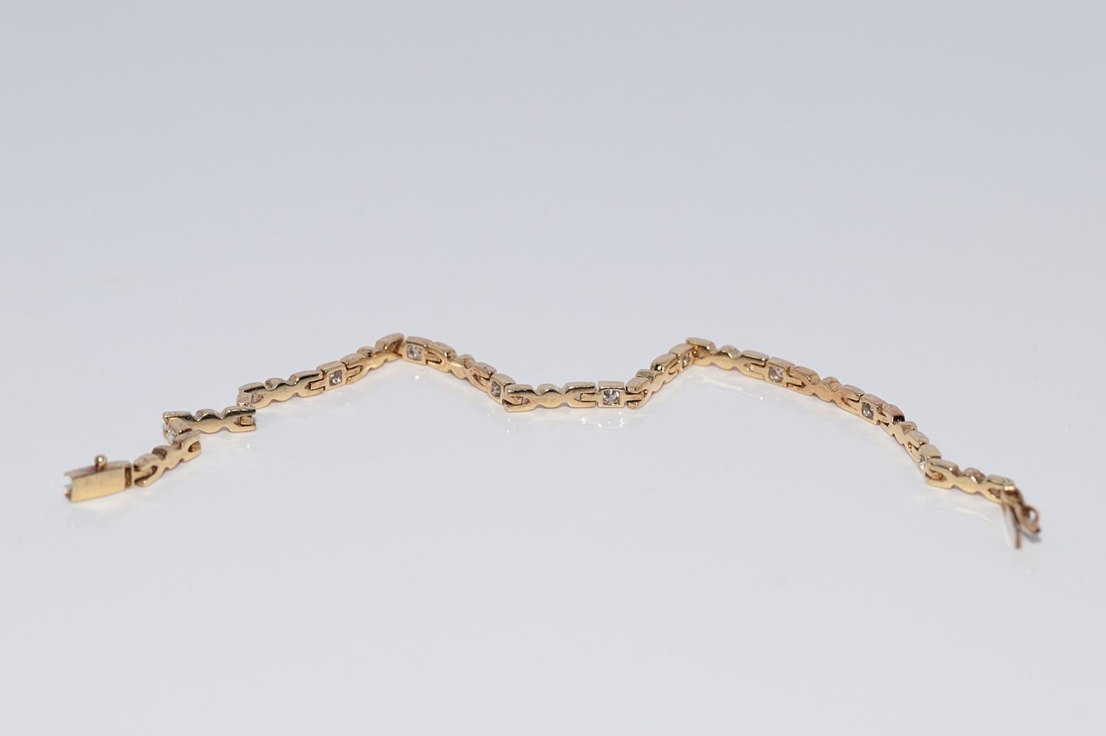 Bracciale da tennis decorato con diamanti naturali in oro 18 ct. d'epoca CIRCA 1980 in vendita 7
