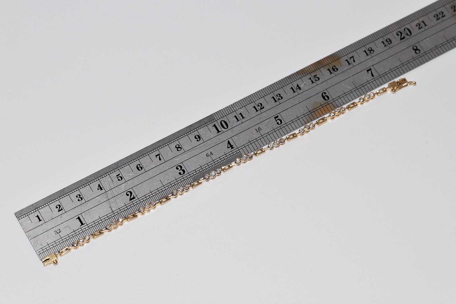 Bracciale da tennis decorato con diamanti naturali in oro 18 ct. d'epoca CIRCA 1980 in vendita 8