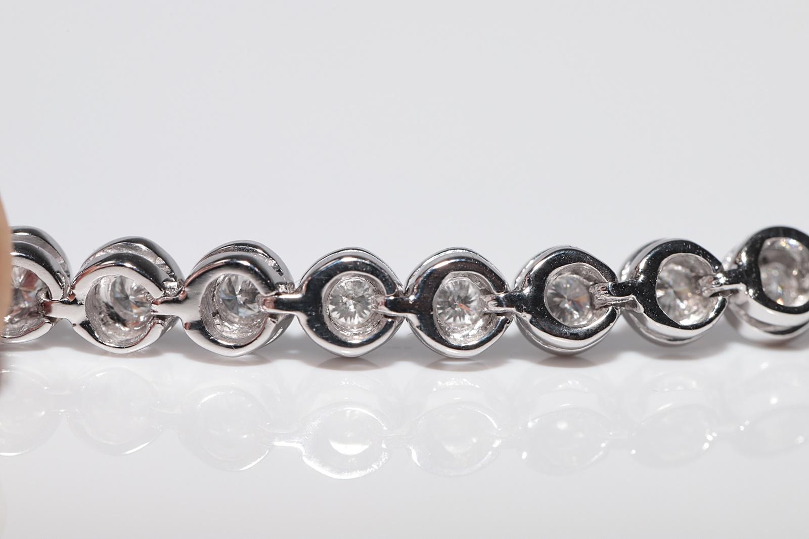 Vintage Circa 1980 Bracelet de tennis en or 18k orné de diamants naturels en vente 9