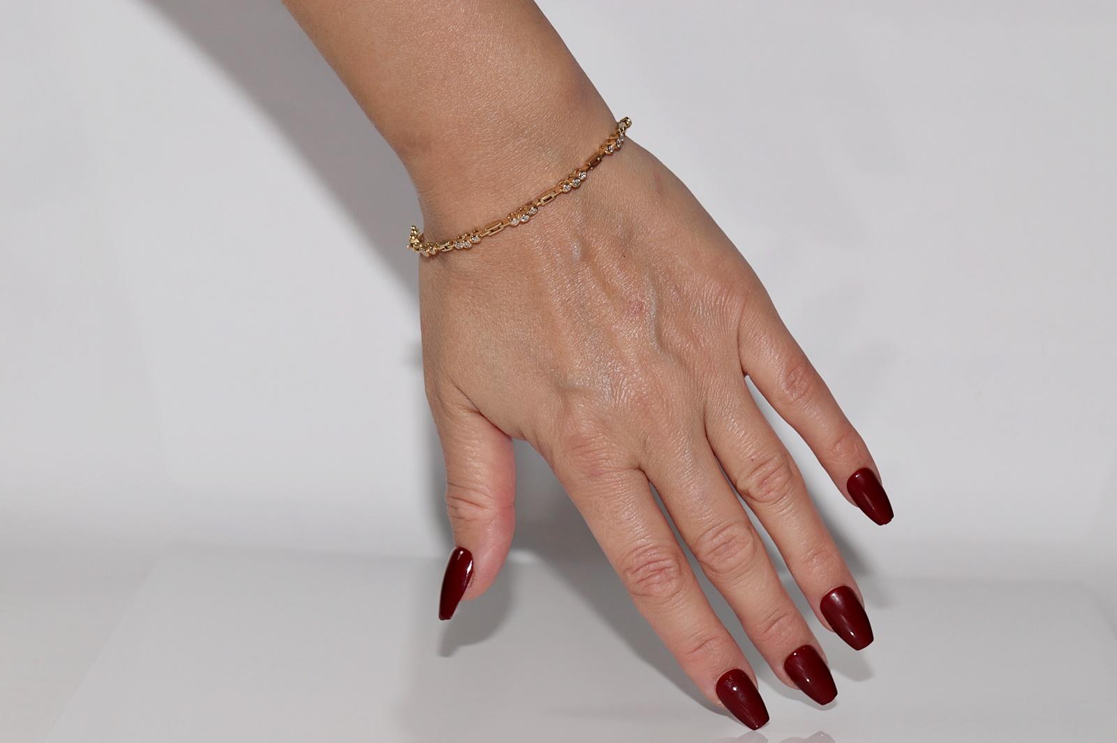 Bracciale da tennis decorato con diamanti naturali in oro 18 ct. d'epoca CIRCA 1980 in vendita 9