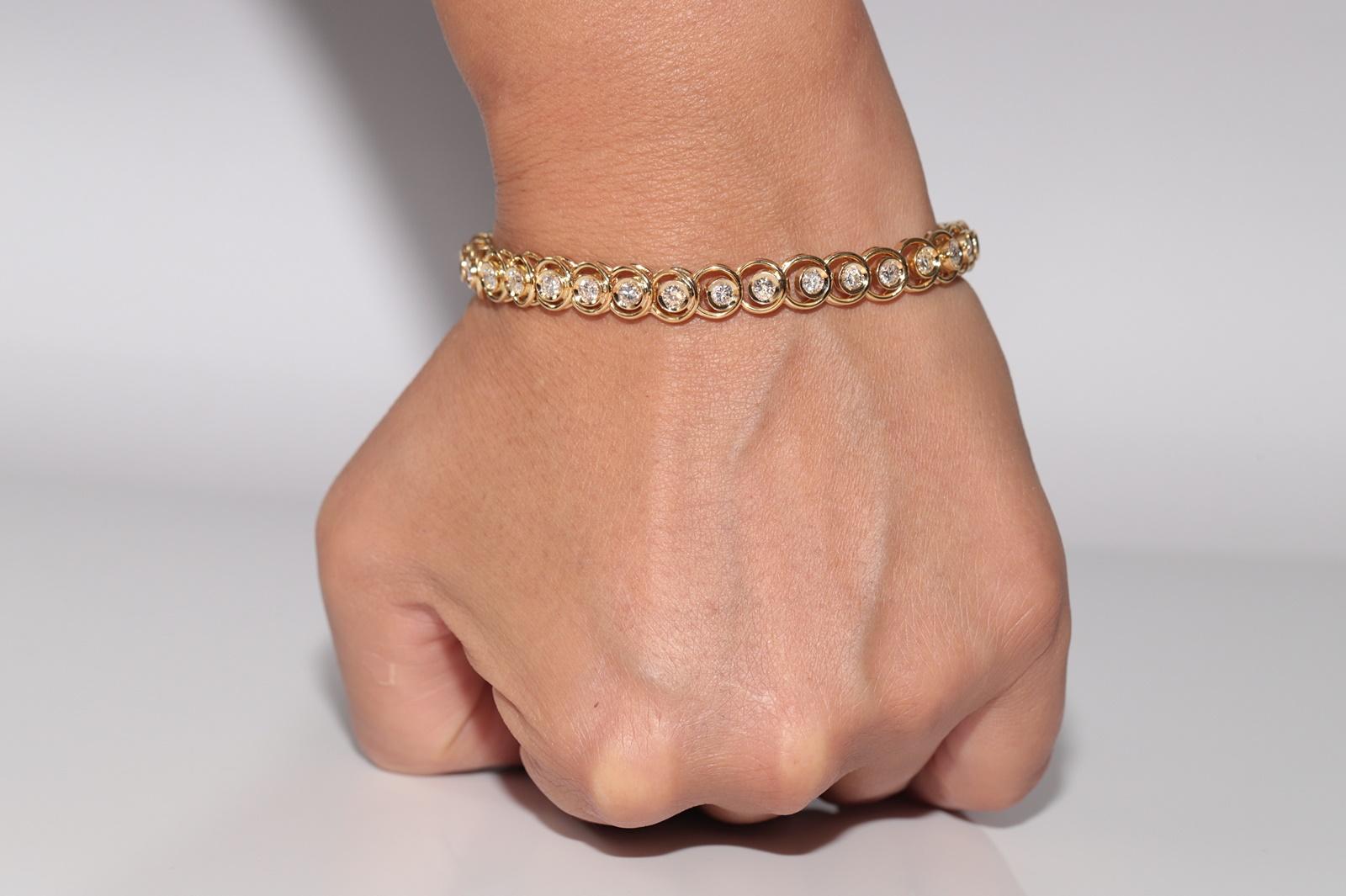 Bracciale da tennis decorato con diamanti naturali in oro 18 ct. d'epoca CIRCA 1980 in vendita 10