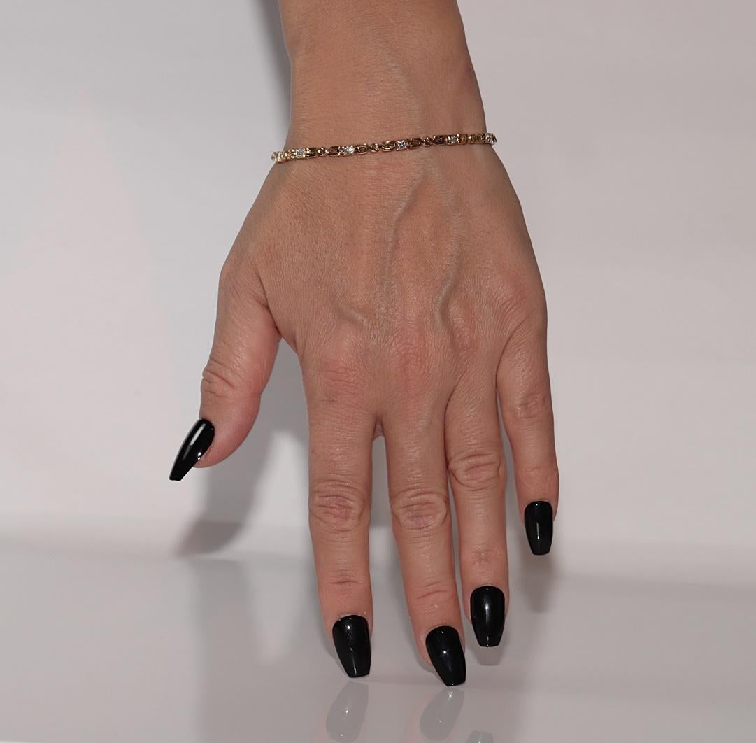 Bracciale da tennis decorato con diamanti naturali in oro 18 ct. d'epoca CIRCA 1980 in vendita 10